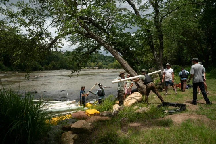 PVC pipes swept away by Hurricane Helene flooding still dominate cleanup of North Carolina river